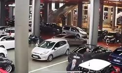 Çarşaf giyip otomatik silahla oto galeriye kurşun yağdırdı